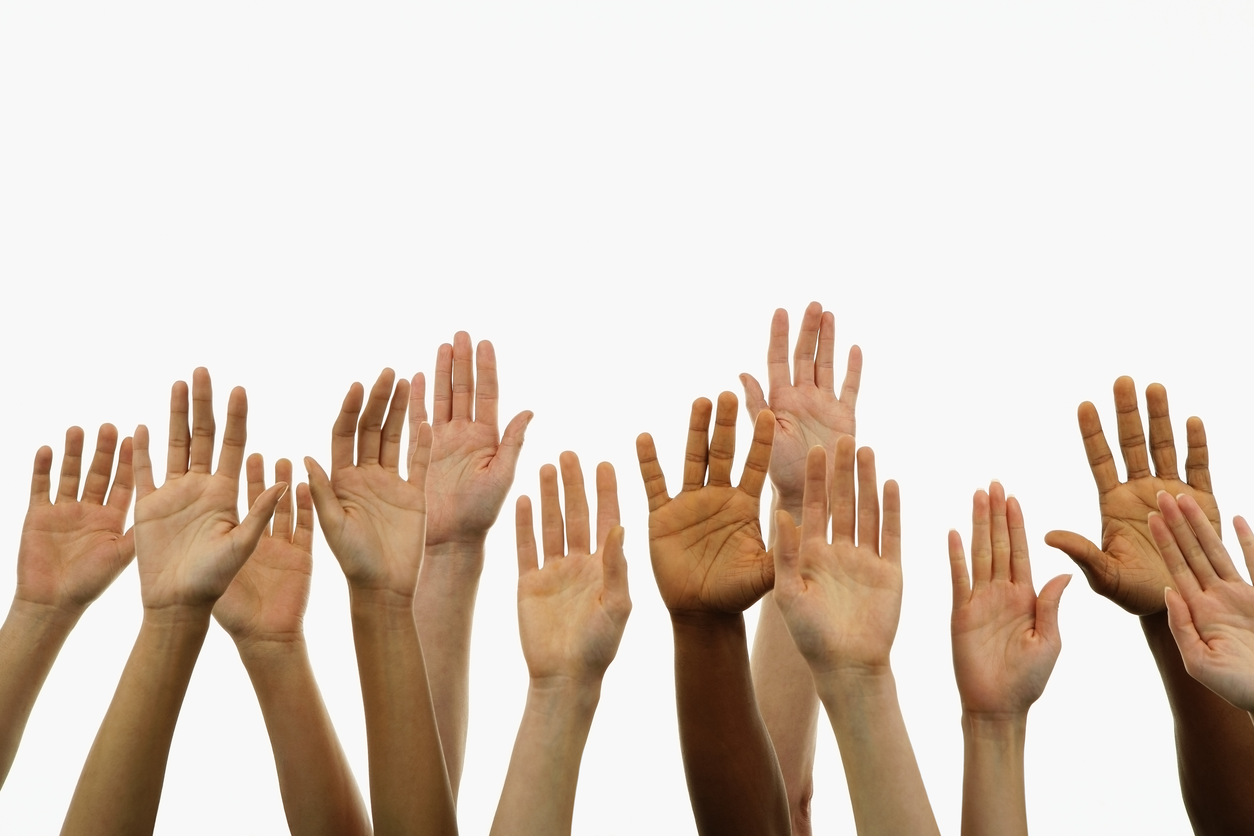 Several people holding their hands in the air Community Action